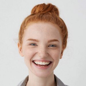 Young woman smiling confidently with bright, healthy-looking teeth