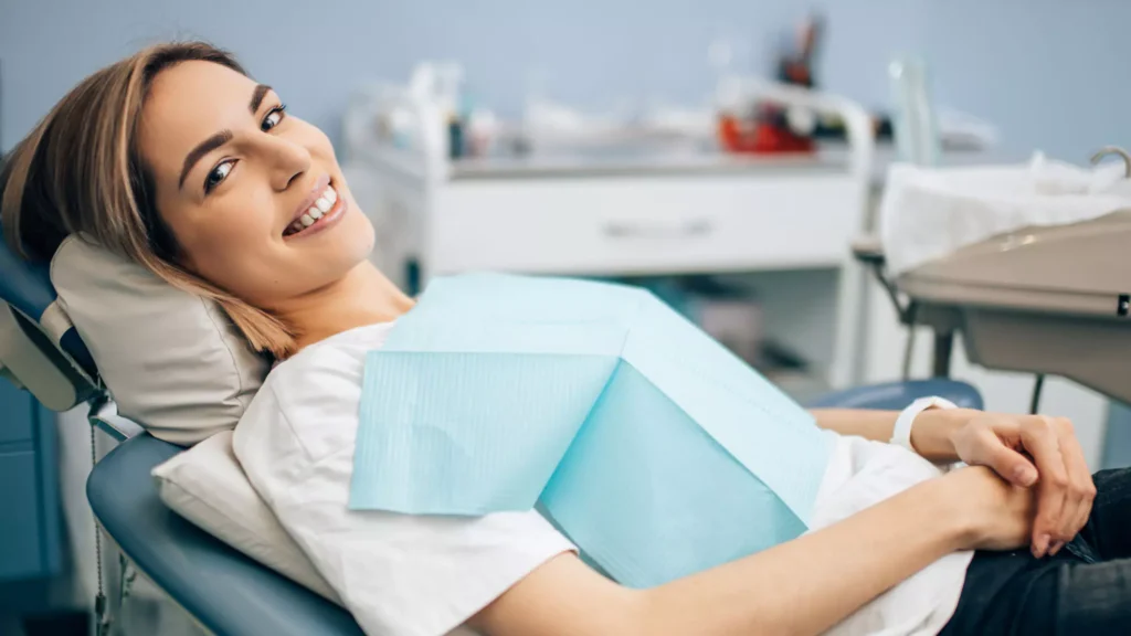 Patient during a dental examination highlighting the importance of oral cancer screenings