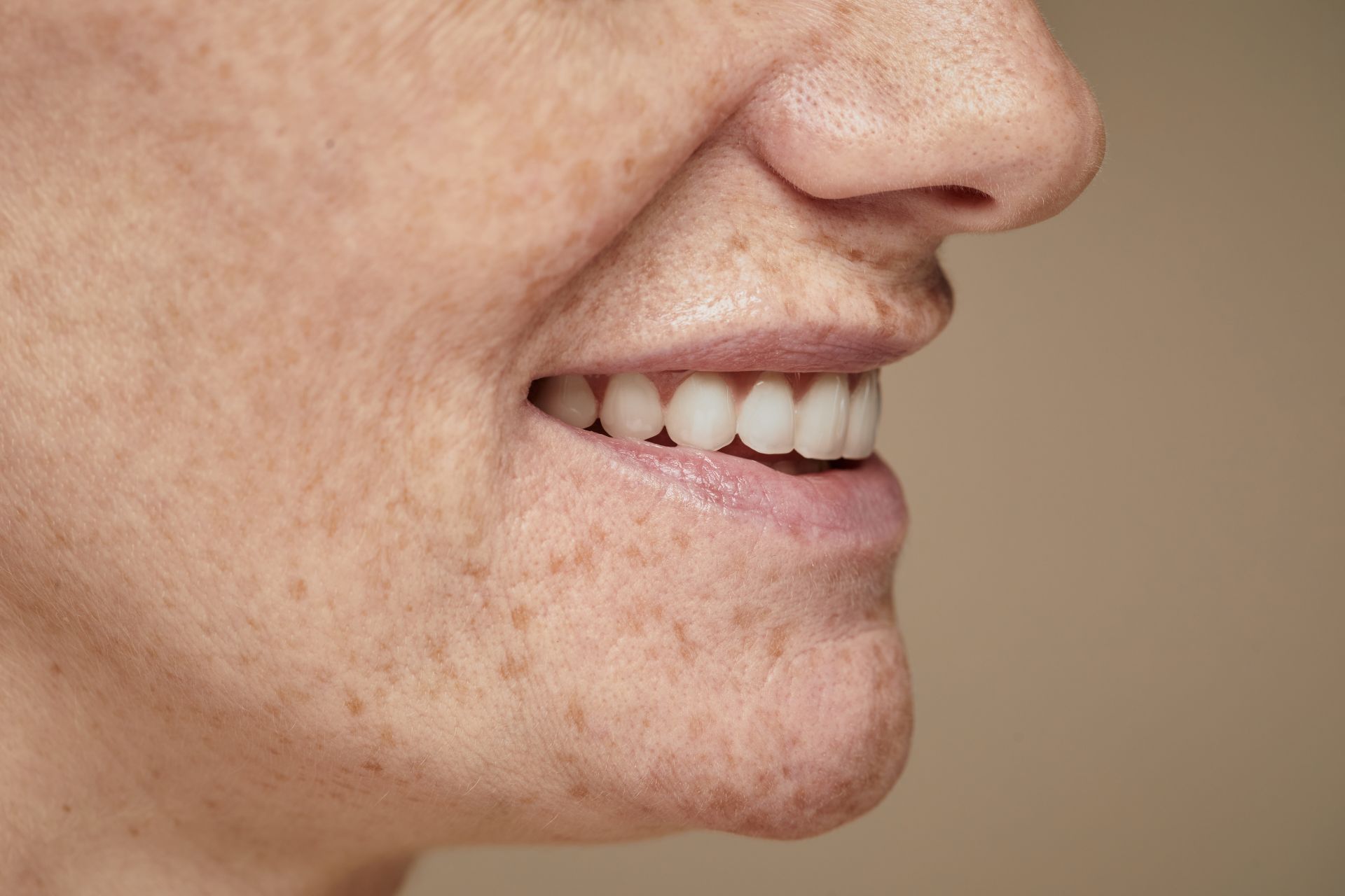 Close-up side view of a natural healthy smile after restorative or cosmetic dental care
