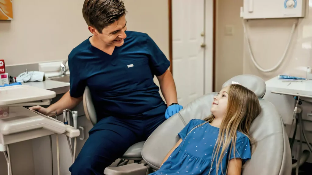 Dr. Matthew Liesen providing dental care to a patient at Liesen Family Dental in Collinsville, IL